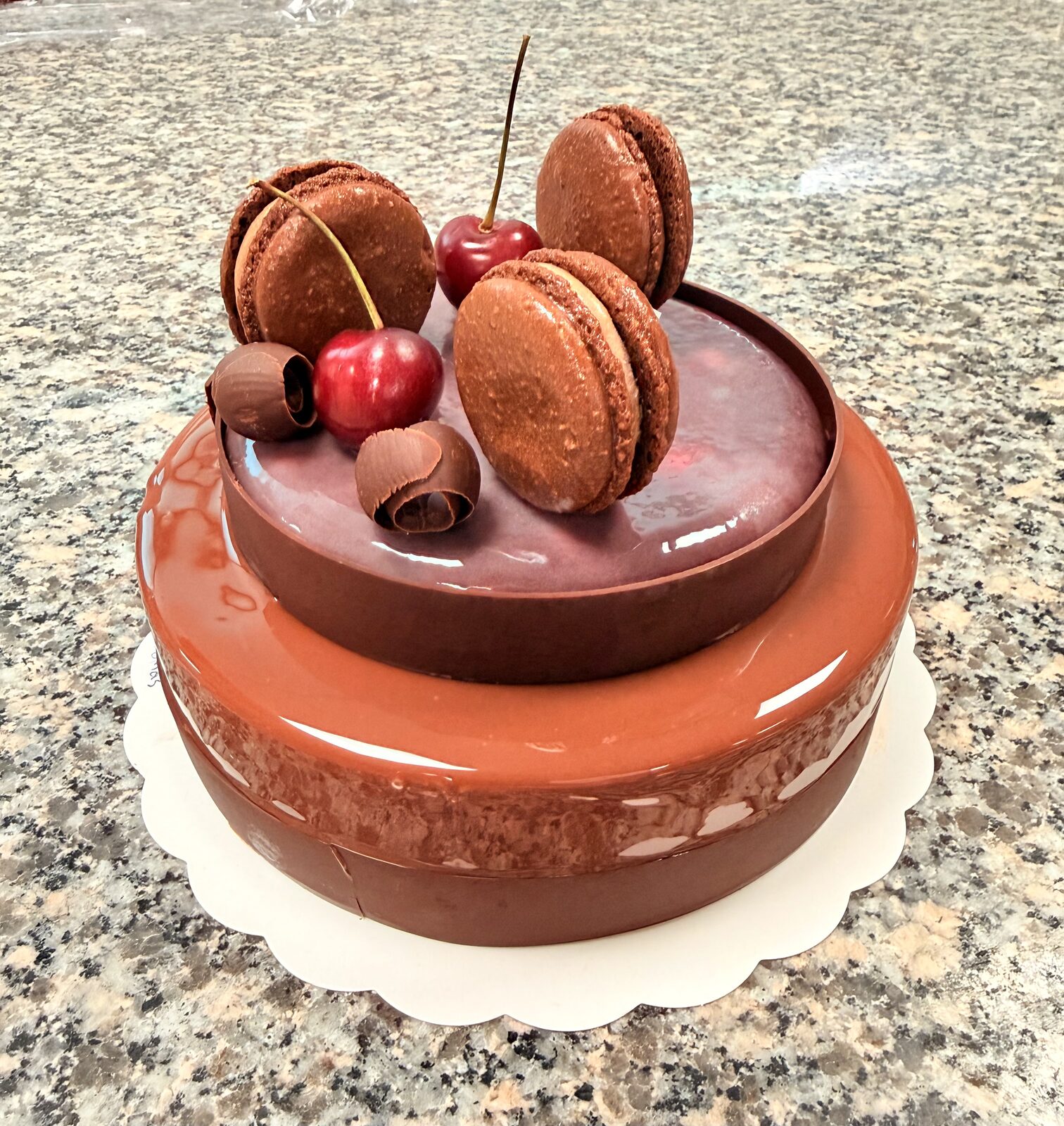 Chocolate Entremet with Macarons and Cherries