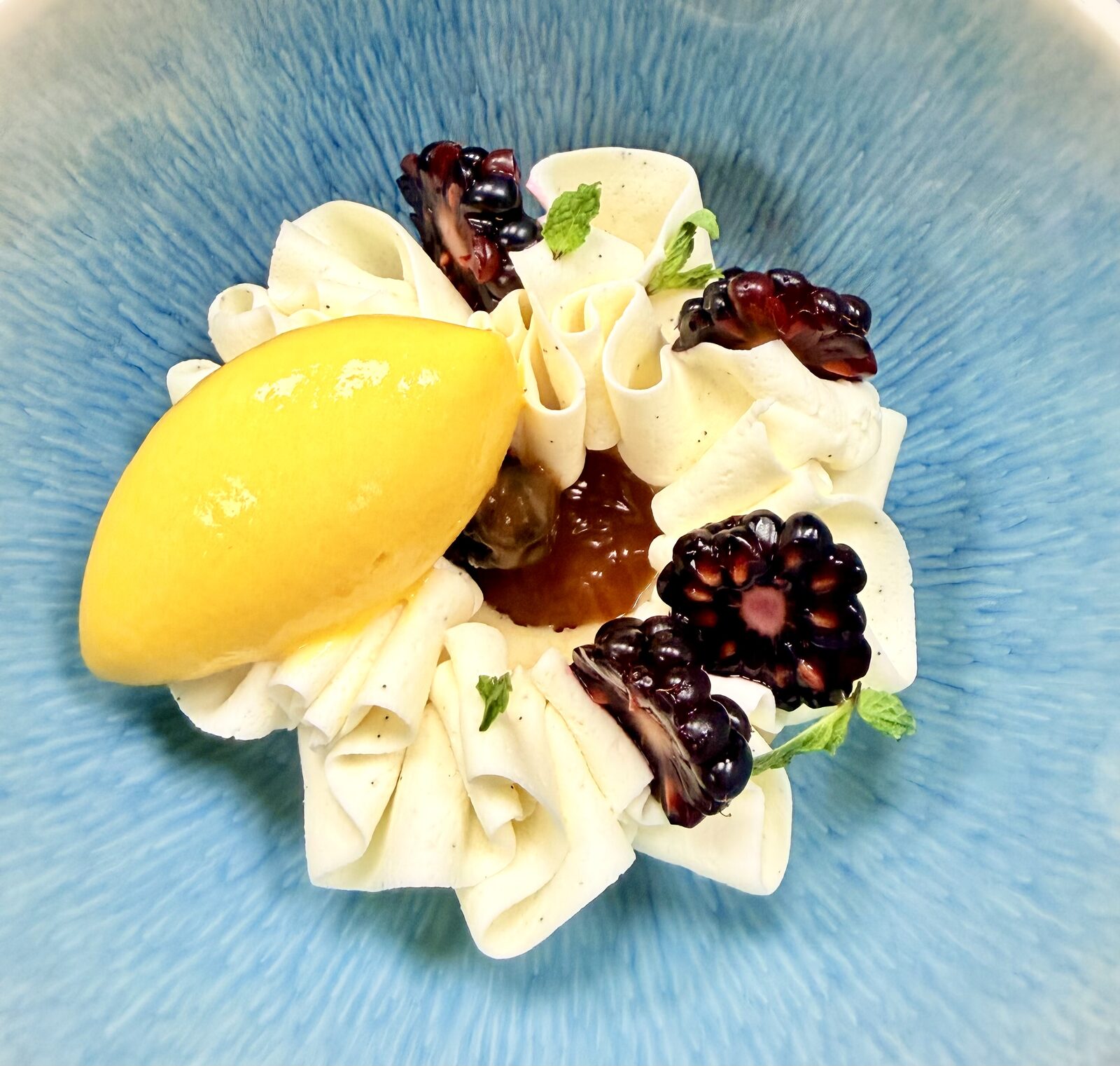 Passion Fruit Mousse with Mango Sorbet and Berries